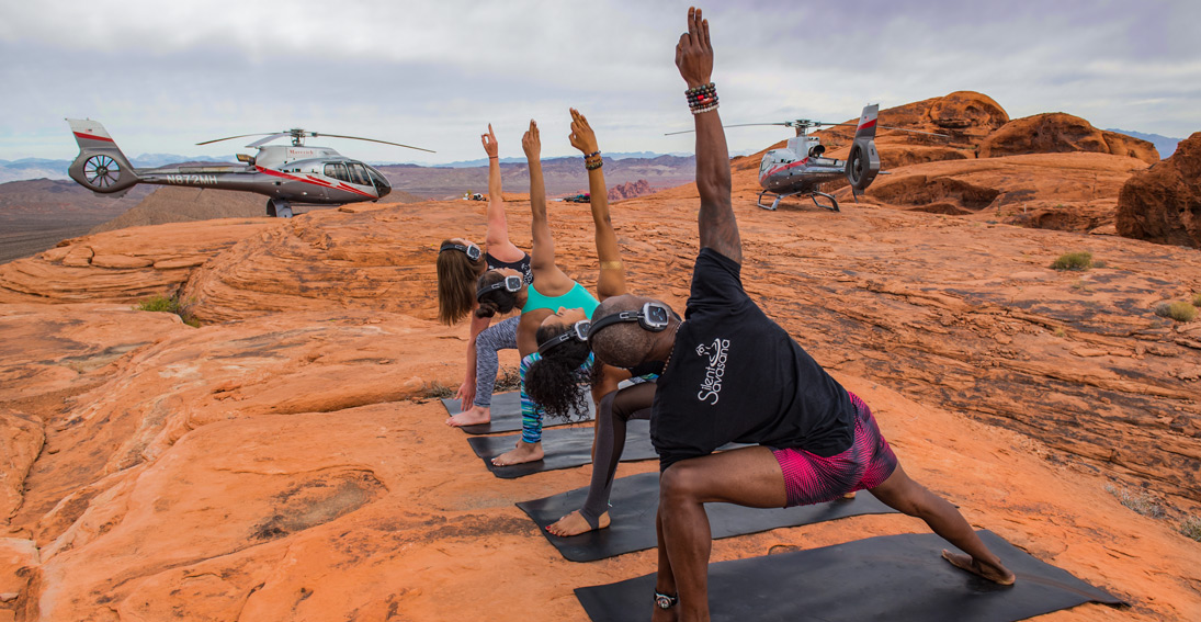 A private helicopter charter with yoga inside the Valley of Fire