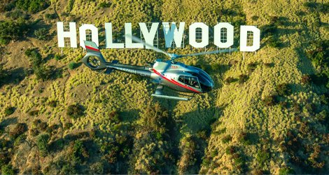 Embark on a glamorous adventure with the iconic Hollywood Sign from the heights of a helicopter.