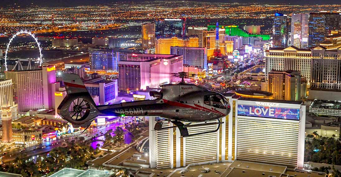 Sunset return over the neon lights of the Vegas Strip