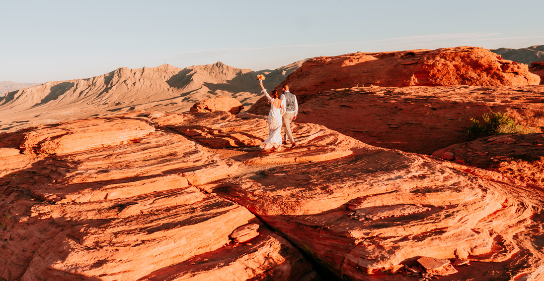 Intimate Valley of Fire wedding ceremony with stunning red rock formations and desert vistas